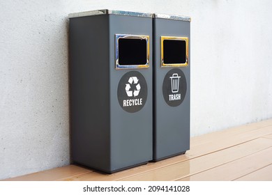two gray trash cans with general waste and recycling on outdoor background - Shutterstock ID 2094141028
