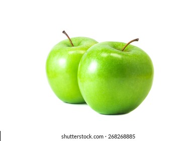 Two Green Apples Are Next To Each Other