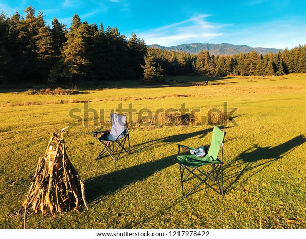 Two Green Chairs Around Fire Pit Royalty Free Stock Image