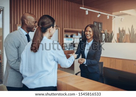 Similar – Image, Stock Photo Young woman in hotel corridor