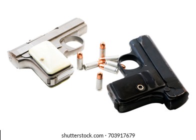 Two Guns And And .25 Caliber Bullets. Isolated On A White Background.