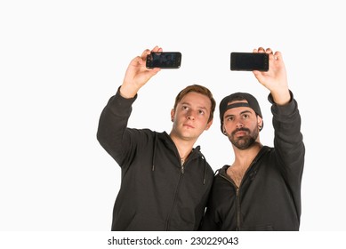 Two Guys In Their Twenties Having Fun With Selfies