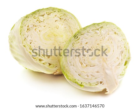 Two halves of cabbage isolated on a white background.