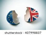 the two halves of a cracked eggshell, one patterned with the flag of the European Community and the other one patterned with the flag of the United Kingdom