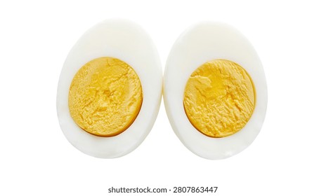 Two halves of a hard boiled egg with yellow yolk and white albumen