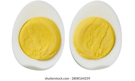 Two halves of a hard boiled egg with yellow yolk and white albumen