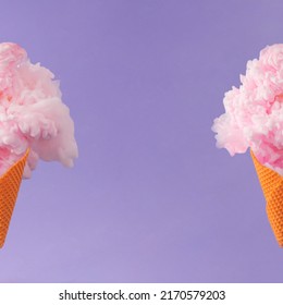 Two Halves Of Orange Ice Cream Cone With Pastel Pink Color Paint Against Purple Background. Minimal Abstract Summer Concept.  Surreal Creative Party Snack Idea With Copy Space.