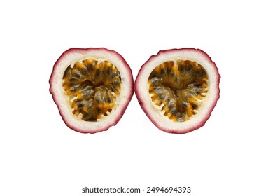 Two halves of passion fruit on white background. Maracuya - exotic tropical fruit. Close up of ripe tasty passionfruit. Purple rind and juicy pulp inside. Passion fruit with cut in half sliced. - Powered by Shutterstock