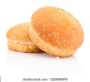 Two hamburger buns with sesame isolated on white background