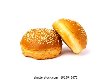 Two Hamburger Buns With Sesame Seeds Isolated On A White Background.