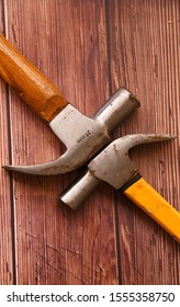 Two Hammers with wooden background/ Lighting - Shutterstock ID 1555358750