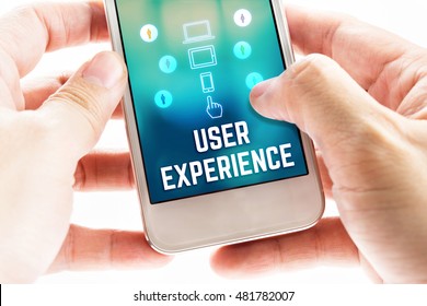 Two hand holding mobile with user experience and icon on blur screen,Online Digital business concept.
