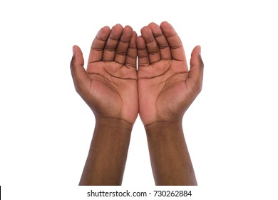 Two hand holding or offering something, isolated on white background. Open black male palms, handful gesture
