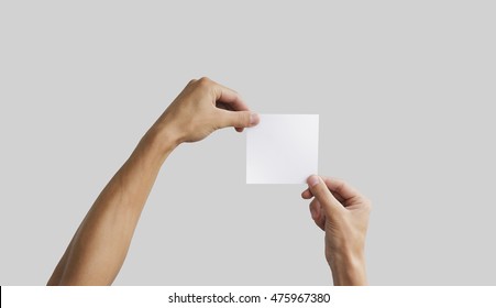 Two Hand Holding Square Paper In The Hand. Leaflet Presentation. Pamphlet Hand Man. Man Show Offset Paper. Sheet Template. Book In Hands. Booklet Folding Design. Fold Paper Sheet Display Read.