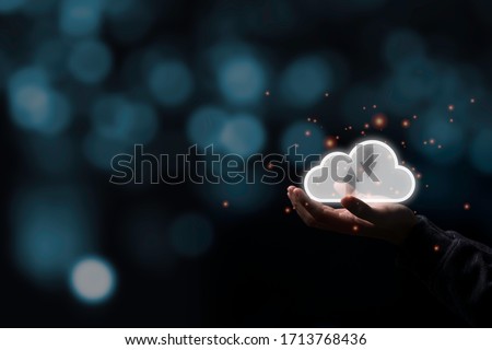 Two hand holding virtual  cloud illustration icon with black background. Cloud technology system is computing sharing management for upload download  transfer electronic information and application.