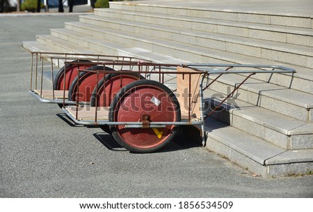 Two handcart on the staircase.