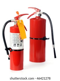 Two  hand-held home or office fire extinguishers.  The small one demonstrates how it should be used and contains a blank monthly inspection tag.  Isolated on white.