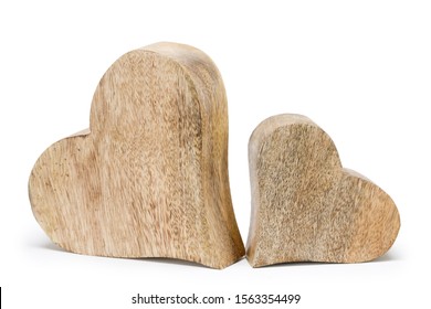 Two handmade wooden carved hearts isolated on white background couple relationship Valentine day concept