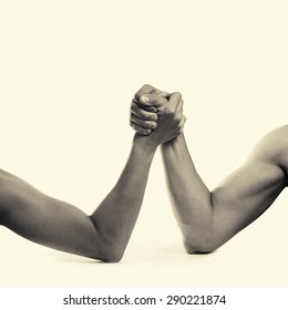  two hands depicting the rivalry of men and women