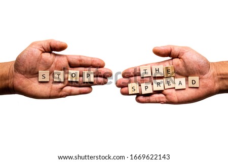Two hands display the message 