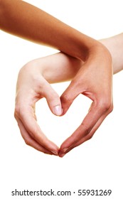Two Hands Form A Heart Shape With Their Fingers