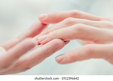 Two hands gently touching with fingers close up. Love, skin care, tenderness, relationship, Valentine's day, hands cream, softness, concept. - Shutterstock ID 1912396642