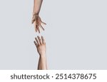 Two hands, helping arm of a friend, teamwork. Rescue, helping gesture or hands. Helping hand concept, support. Two hands, shaking hands. Vertical, help.