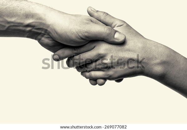 Two hands (helping hand\
to a friend)