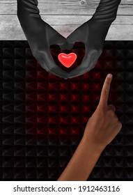 Two Hands Hold Glowing Red Heart Against Dark Background And Female Finger Swipes Right