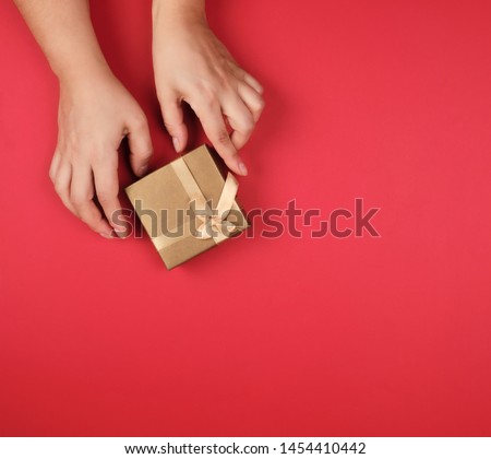 Similar – Image, Stock Photo closed golden gift box with a bow