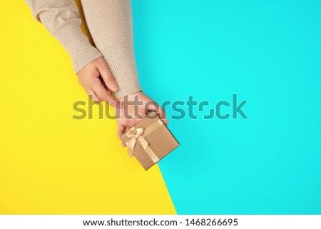 Similar – Image, Stock Photo closed golden gift box with a bow