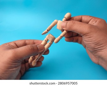 Two hands hold the