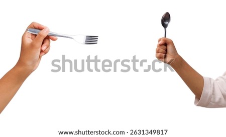 Two hands holding a fork and a spoon facing each other on white background symbolizing culinary battle or debate