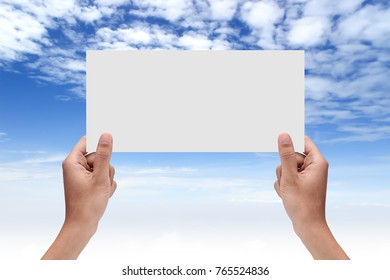 Two Hands Holding A White Paper