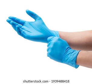 Two hands of a man wearing nitrile gloves on a white background - Shutterstock ID 1939488418