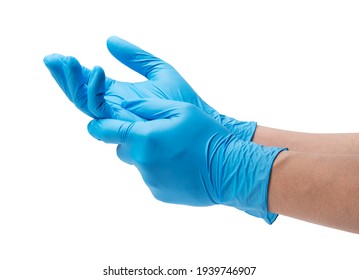 Two hands of a man wearing nitrile gloves on a white background - Shutterstock ID 1939746907