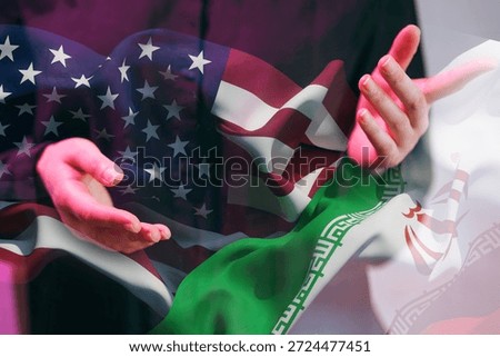 Two hands are positioned as if reaching out, with the flags of the United States and Iran softly visible in the background, suggesting a dialogue or negotiation setting.