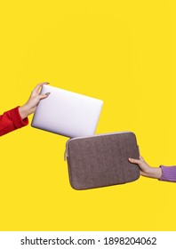 Two Hands Put Laptop In A Cover Case On Yellow Background.