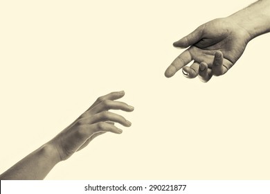  two hands reaching toward each other - Shutterstock ID 290221877