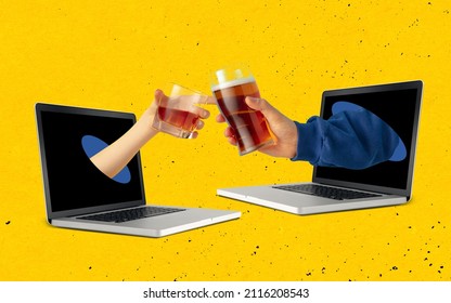 Two hands sticking out laptop screen and clinking beer and whiskey glasses each other isolated over yellow background. Concept of social gathering online, celebration, holiday. Contemporary art