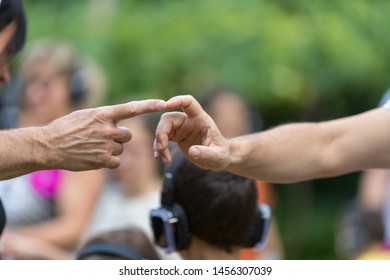 Two Hands Touching, Two Men Touch Their Finger, Concept The Global Gender Gap Report