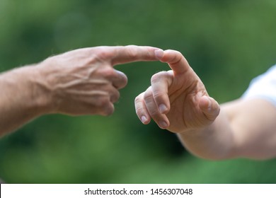 Two Hands Touching, Two Men Touch Their Finger, Concept The Global Gender Gap 