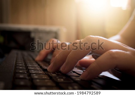 two hands typing black computer keyboard keyboard for technology genre