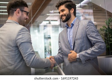 50,487 2 businessmen shaking hands Images, Stock Photos & Vectors ...