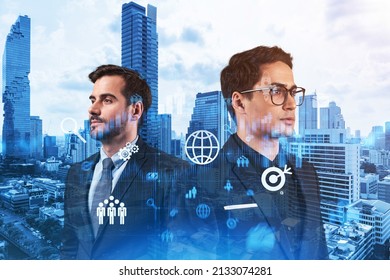 Two handsome businessman in suits thinking about career opportunities at research and development department at international consulting company. Hologram icons over Bangkok background.