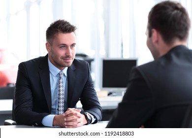 Two Handsome Businessmen In Office