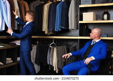 Two Handsome Guys. Young Gay Couple In The Store Buy Clothes.