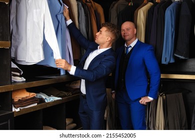 Two Handsome Guys. Young Gay Couple In The Store Buy Clothes.