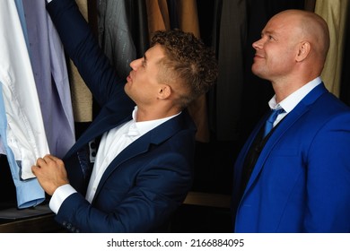 Two Handsome Guys. Young Gay Couple In The Store Buy Clothes.	