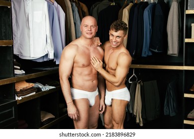 Two Handsome Guys. Young Gay Couple In The Store Buy Clothes.	